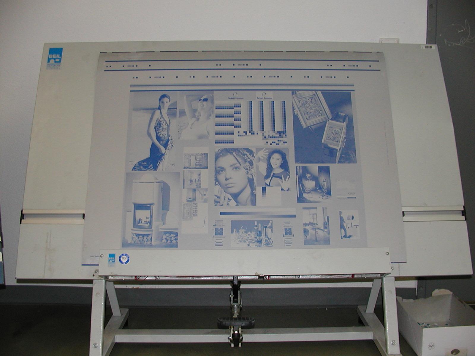 An exposed offset printing plate showing a full page imposition